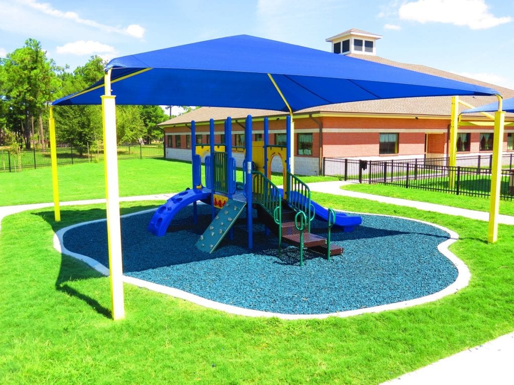 Playground Without Roof Under a Playground Shade Structure with Blue Rubber Mulch Safety Surfacing